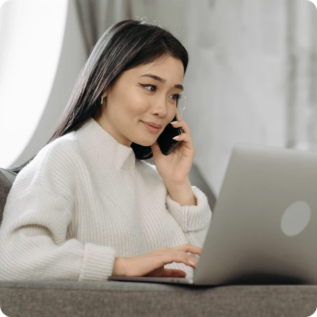 A professional using SimpleSpeak on a laptop